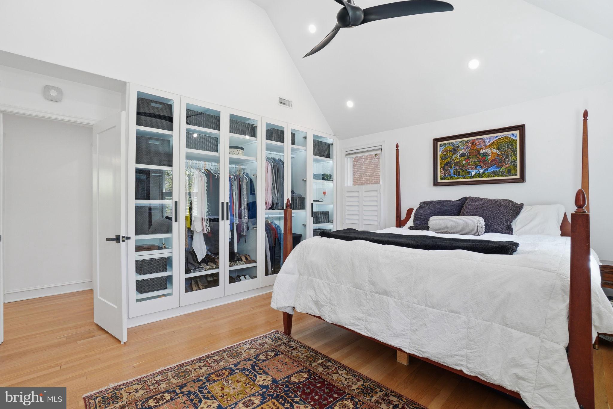 3327 Legation Street Northwest Washington, DC 20015 - Photo 20 of 36 a bedroom with a bed and wooden floor