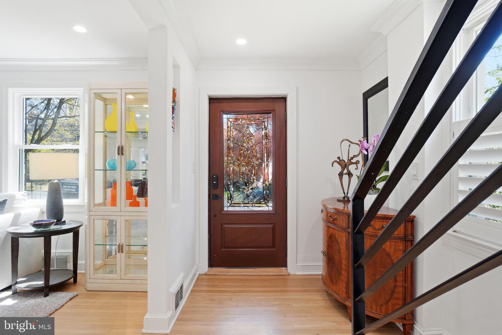 3327 Legation Street Northwest Washington, DC 20015 - Photo 4 of 36 a view of an entryway with wooden floor