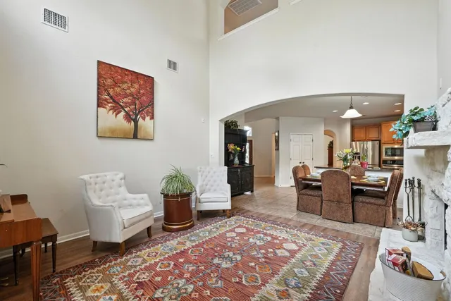 a living room with furniture and a rug
