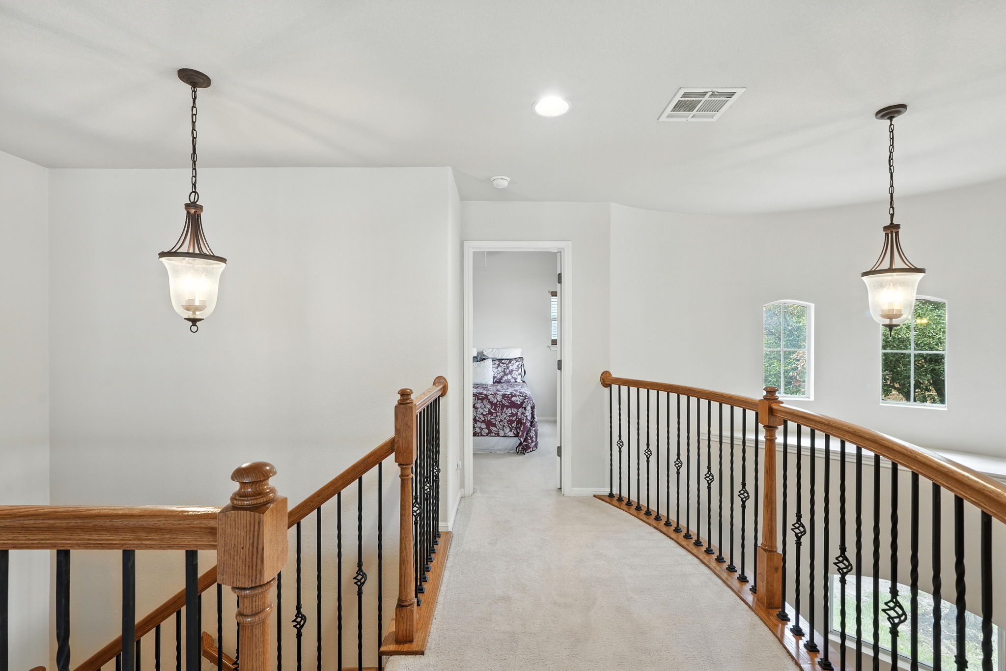 1802 Misty Ridge Leander, TX 78641 - Photo 24 of 39 Corridor with an upstairs landing, carpet floors, and recessed lighting