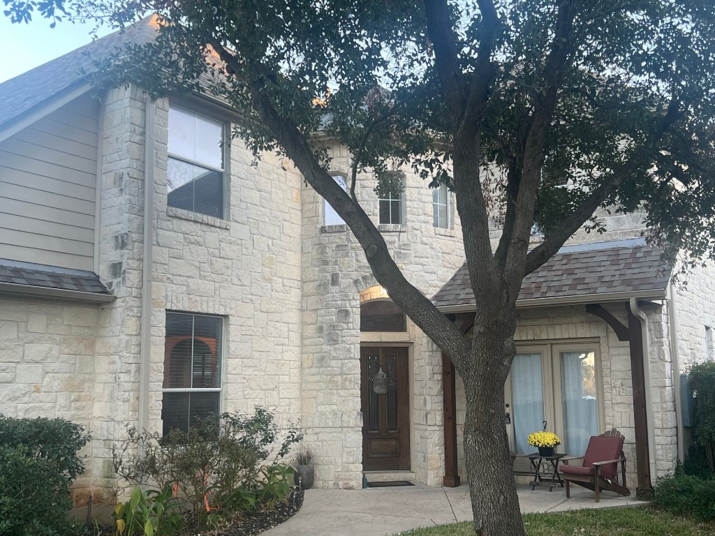 1802 Misty Ridge Leander, TX 78641 - Photo 38 of 39 a front view of a house with garden
