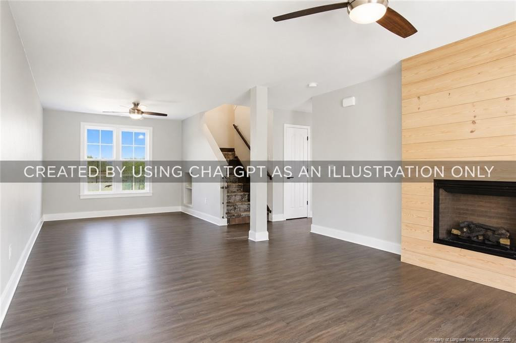 334 Crane Way Bunnlevel, NC 28323 - Photo 11 of 45 a view of an empty room with wooden floor