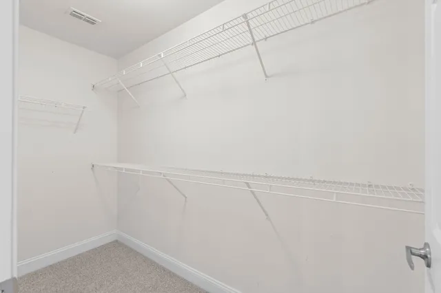 a view of a room with racks on the wall