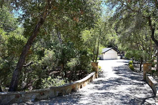 a view of a houses with a yard