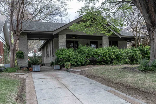 a view of a house with a garden
