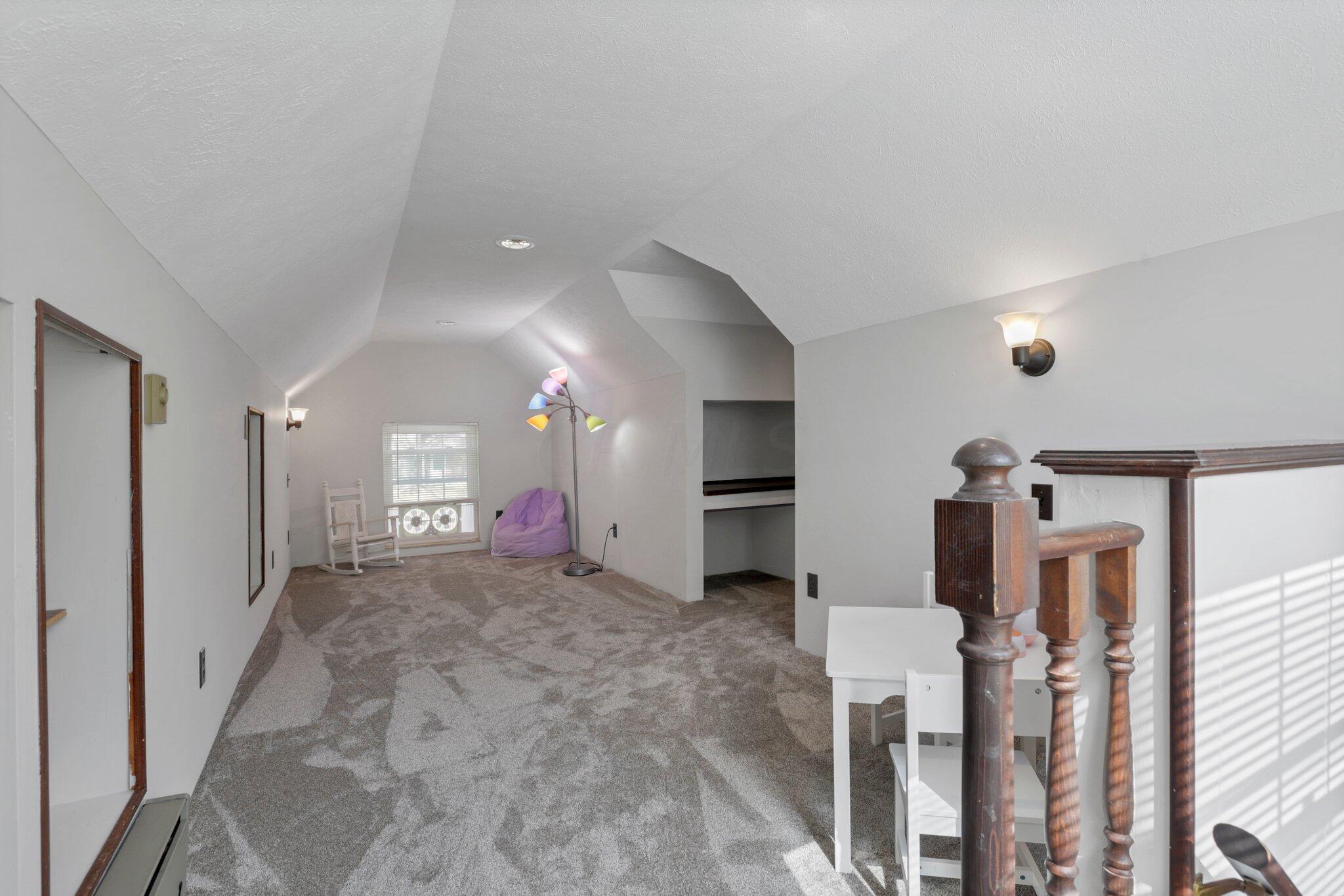 1821 Pine Road Heath, OH 43056 - Photo 36 of 62 Bonus room with steps leading to family room right outside of garage