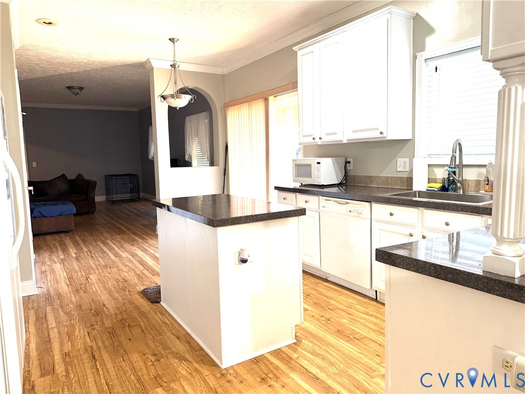 14558 Brick Road Petersburg, VA 23805 - Photo 9 of 27 Kitchen featuring ornamental molding, hanging ligh