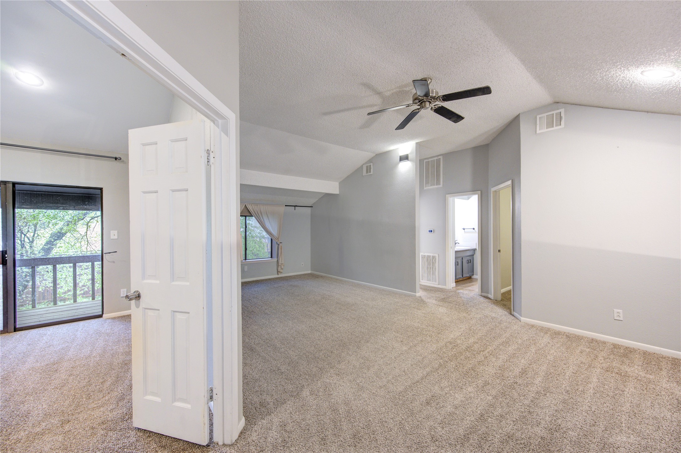 530 Enchanted Lane Spring, TX 77388 - Photo 14 of 26 wooden floor in an empty room with a window