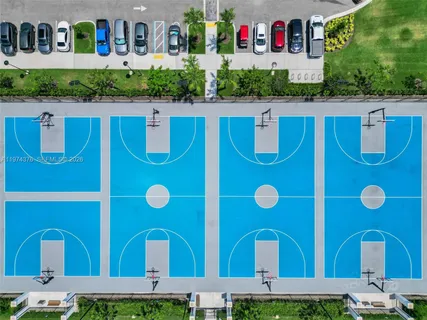 a bathroom with a granite countertop sink a toilet and bathtub