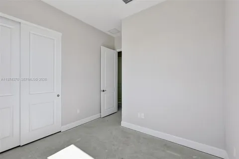 a view of a room that has a window in it