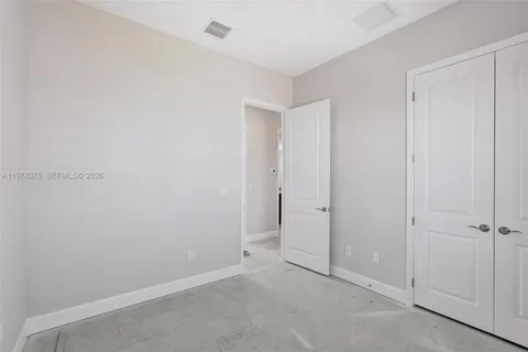 a kitchen with a sink stove and refrigerator