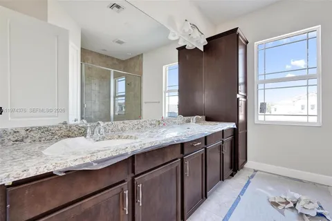 a view of room with clothes and shoes