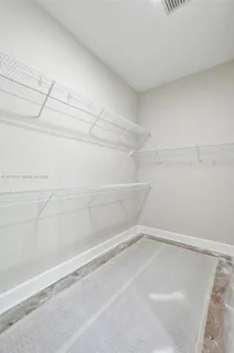 a view of swimming pool with a garden