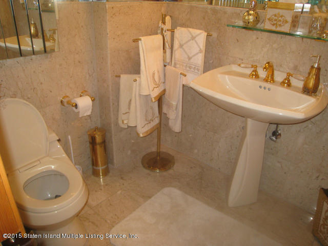 132 Beverly Road Staten Island, NY 10305 - Photo 15 of 38 1/2 bath on level one
