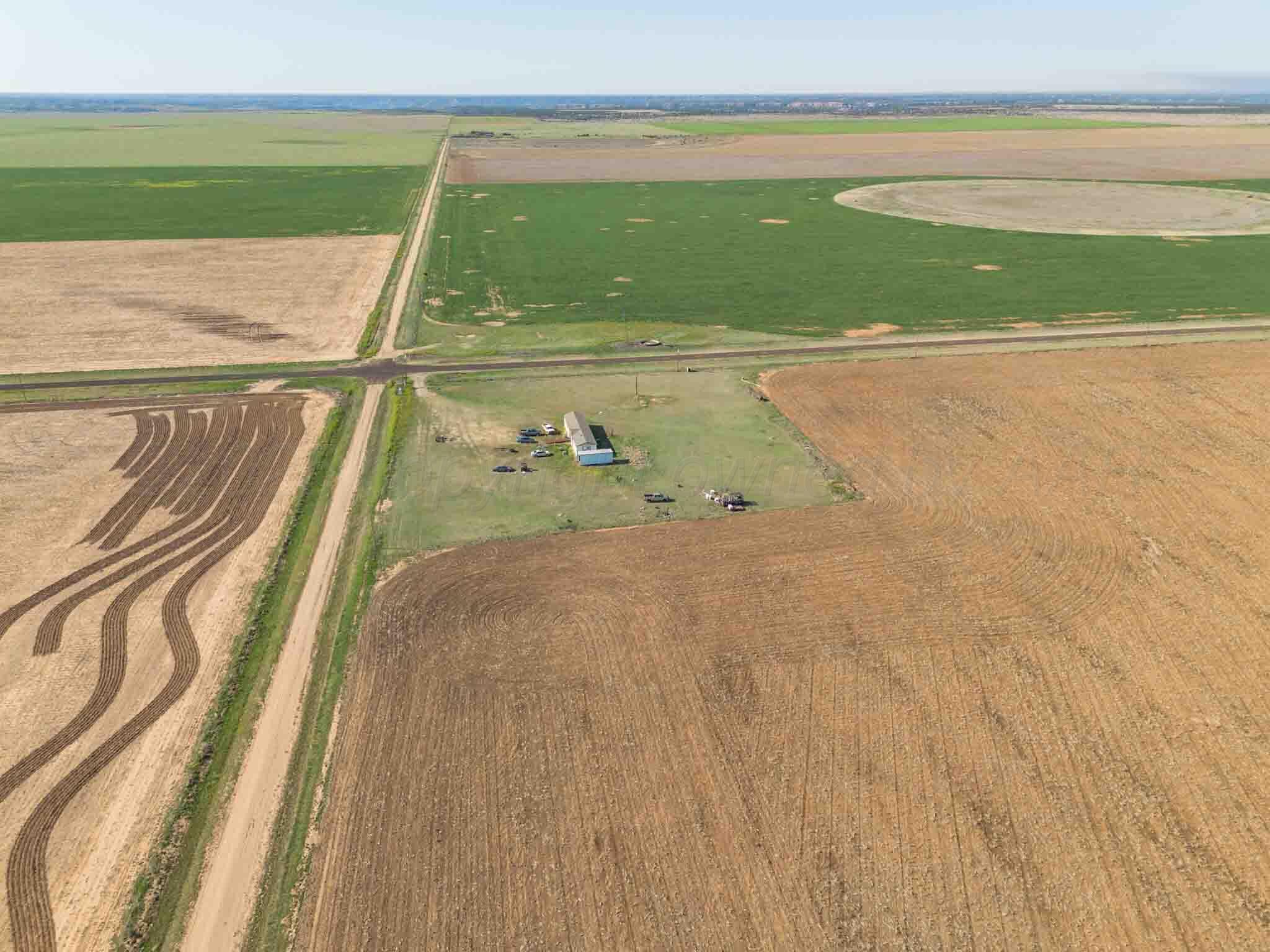 640 Acres Claude, TX 79019 - Photo 8 of 11 a view of swimming pool with seating area and green space