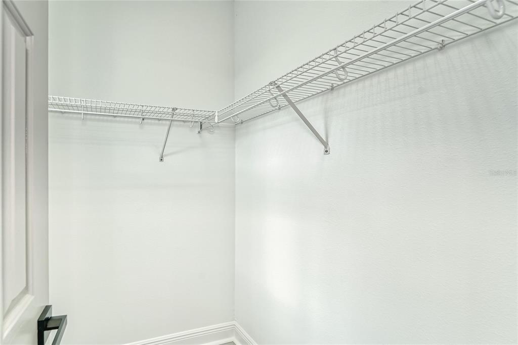 5718 Sea Turtle Place Apollo Beach, FL 33572 - Photo 23 of 81 a view of a rack on the wall