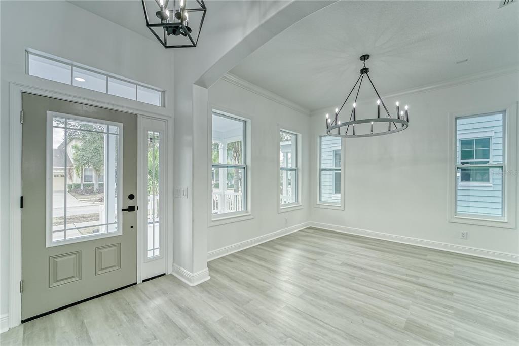 5718 Sea Turtle Place Apollo Beach, FL 33572 - Photo 58 of 81 a view of empty room with wooden floor and window