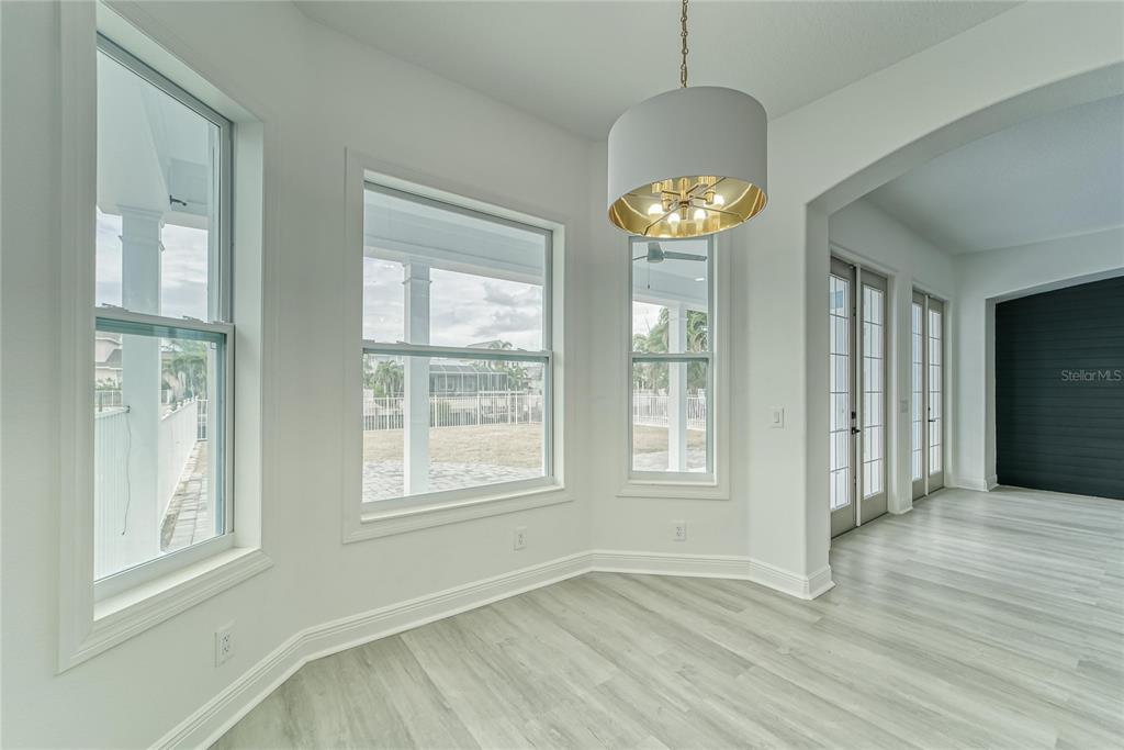 5718 Sea Turtle Place Apollo Beach, FL 33572 - Photo 68 of 81 a view of an empty room with a window and wooden floor