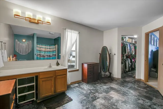 a view of a kitchen with a sink