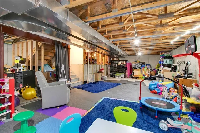 a room with lots of furniture and toys