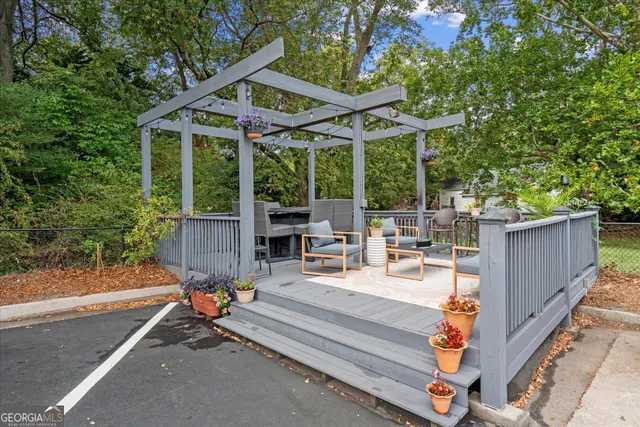 a house view with a sitting space and garden space
