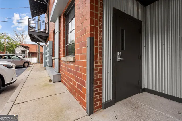 a view of a living room and front door