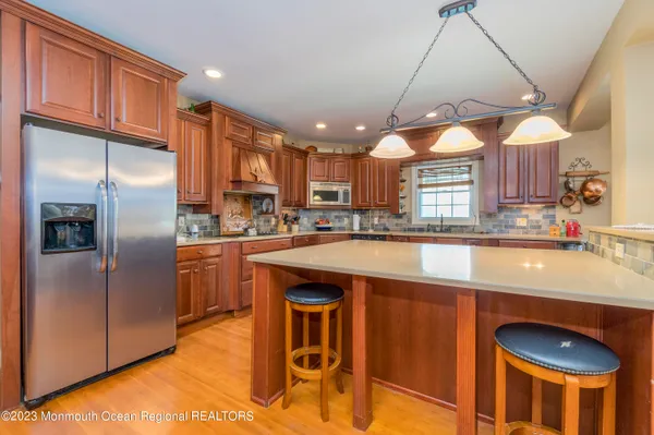 a bedroom with a bed and dresser