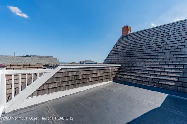 a view of a balcony with city view