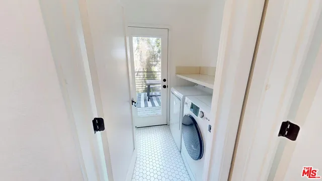 a view of an entryway with a fireplace