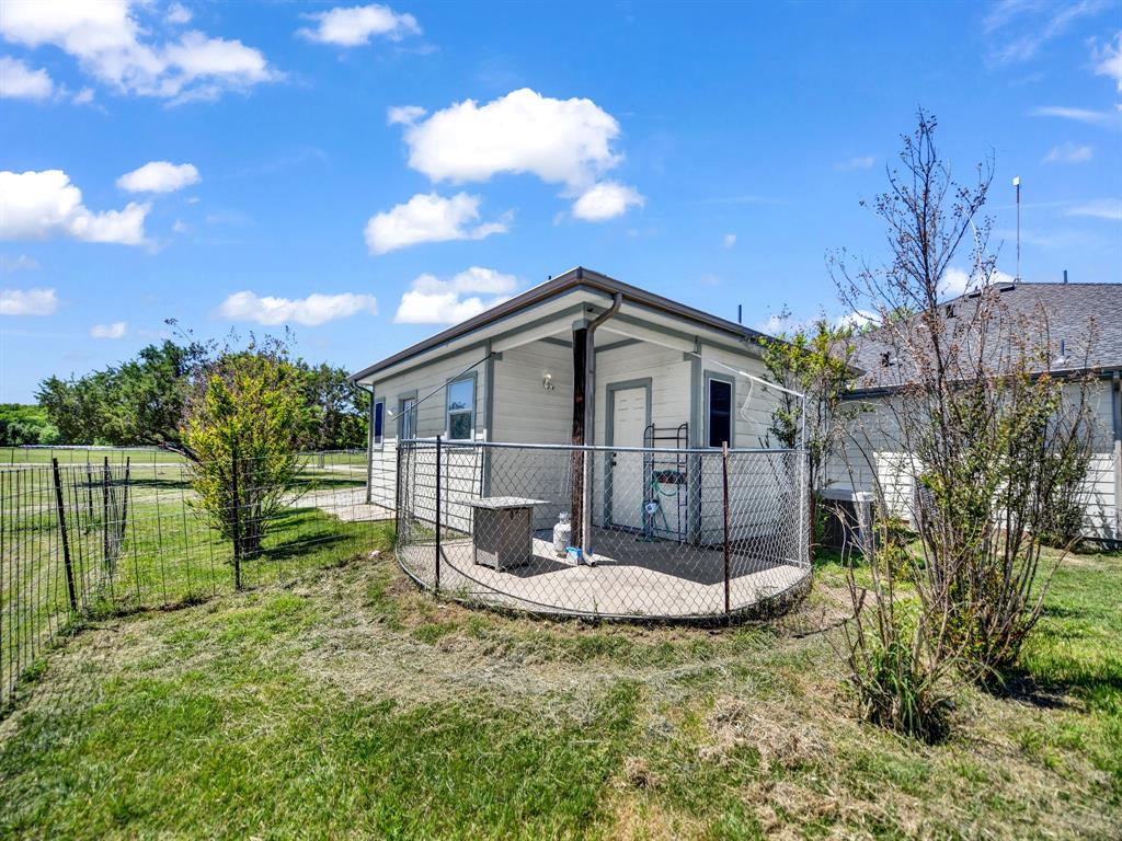 400 Deer Valley Road Weatherford, TX 76085 - Photo 27 of 40 a view of a house with backyard
