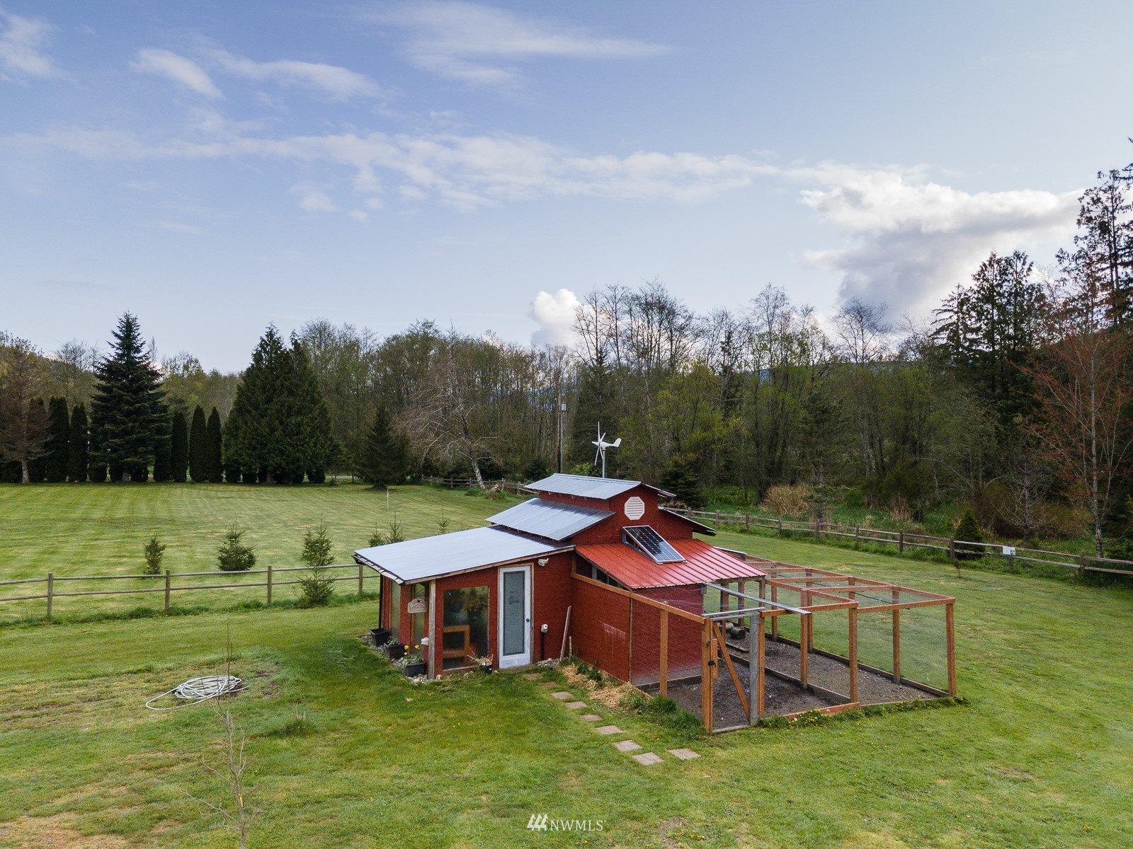 5255 Wickersham Road Acme, WA 98220 - Photo 35 of 40 an aerial view of a house with pool garden and lake view
