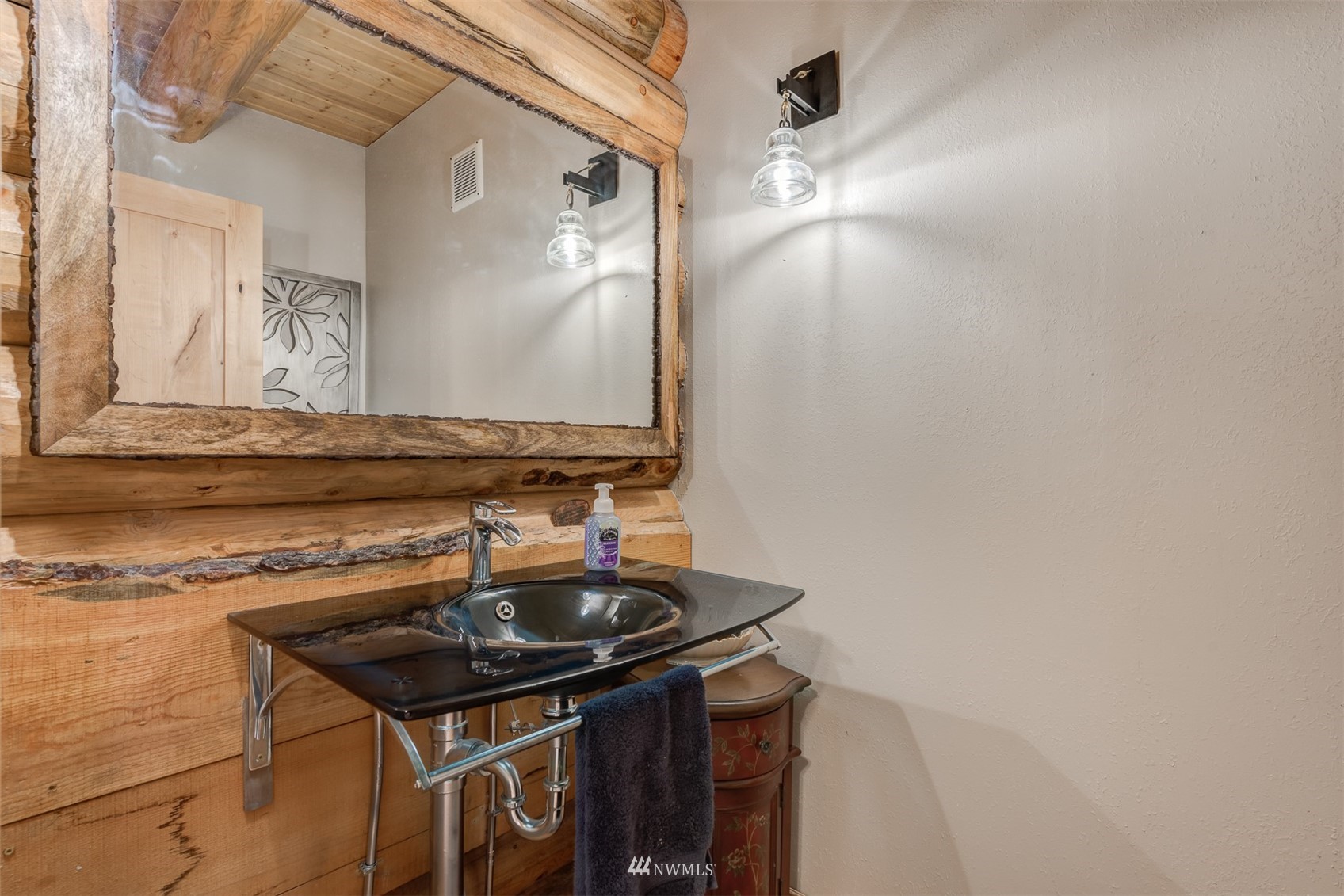 5255 Wickersham Road Acme, WA 98220 - Photo 10 of 40 a bathroom with a sink and a mirror
