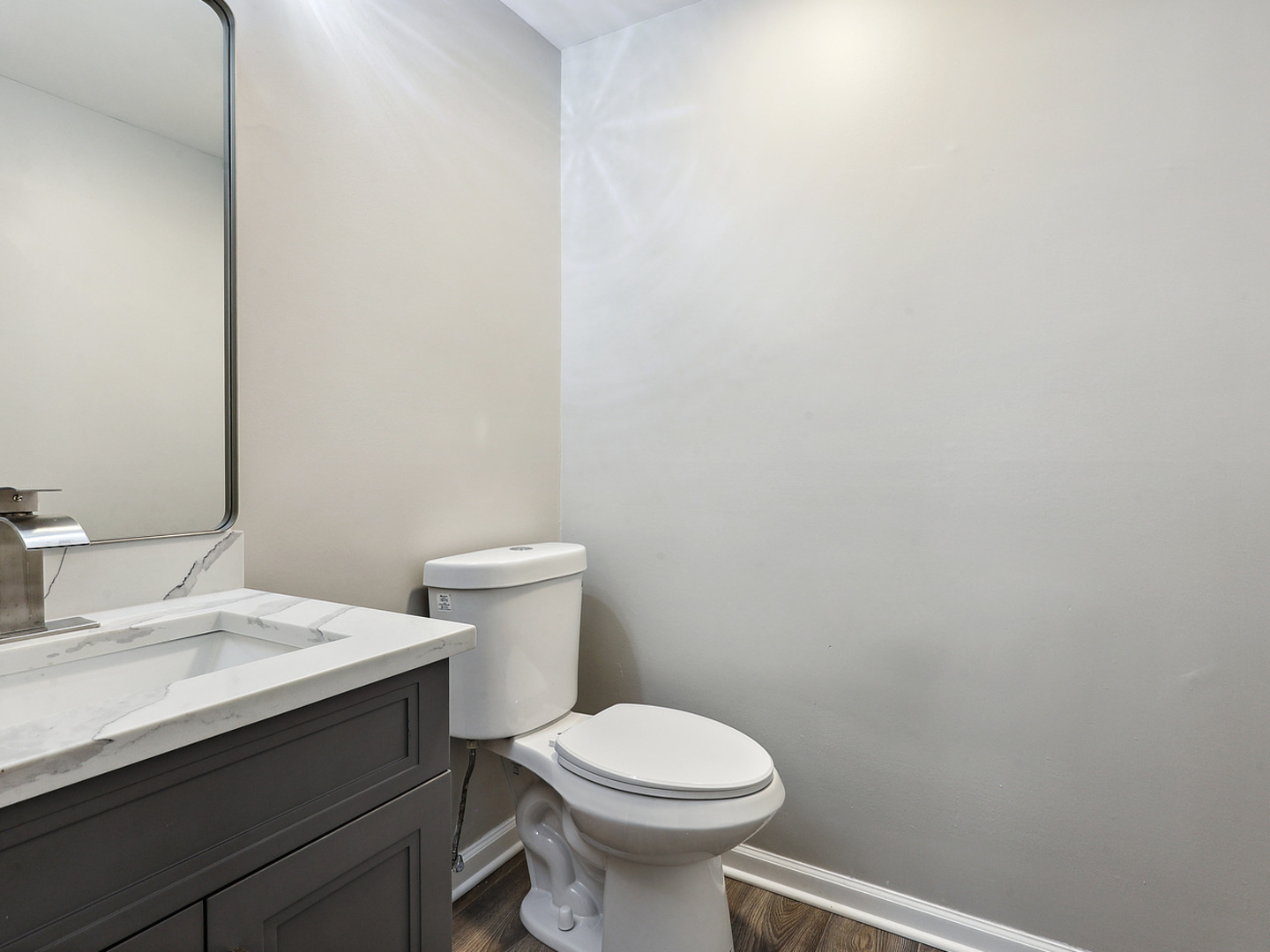1057 Bothwell Circle Bolingbrook, IL 60440 - Photo 13 of 14 a bathroom with a sink and a toilet