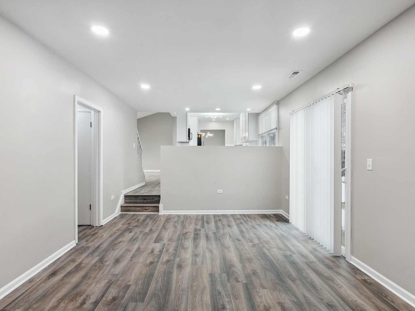 1057 Bothwell Circle Bolingbrook, IL 60440 - Photo 2 of 14 a view of a kitchen with wooden floor