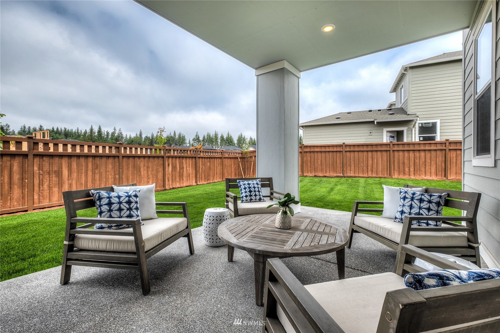 23318 41st Drive Southeast, Unit 68 Bothell, WA 98021 - Photo 12 of 24 a view of a patio with couches chairs and a table