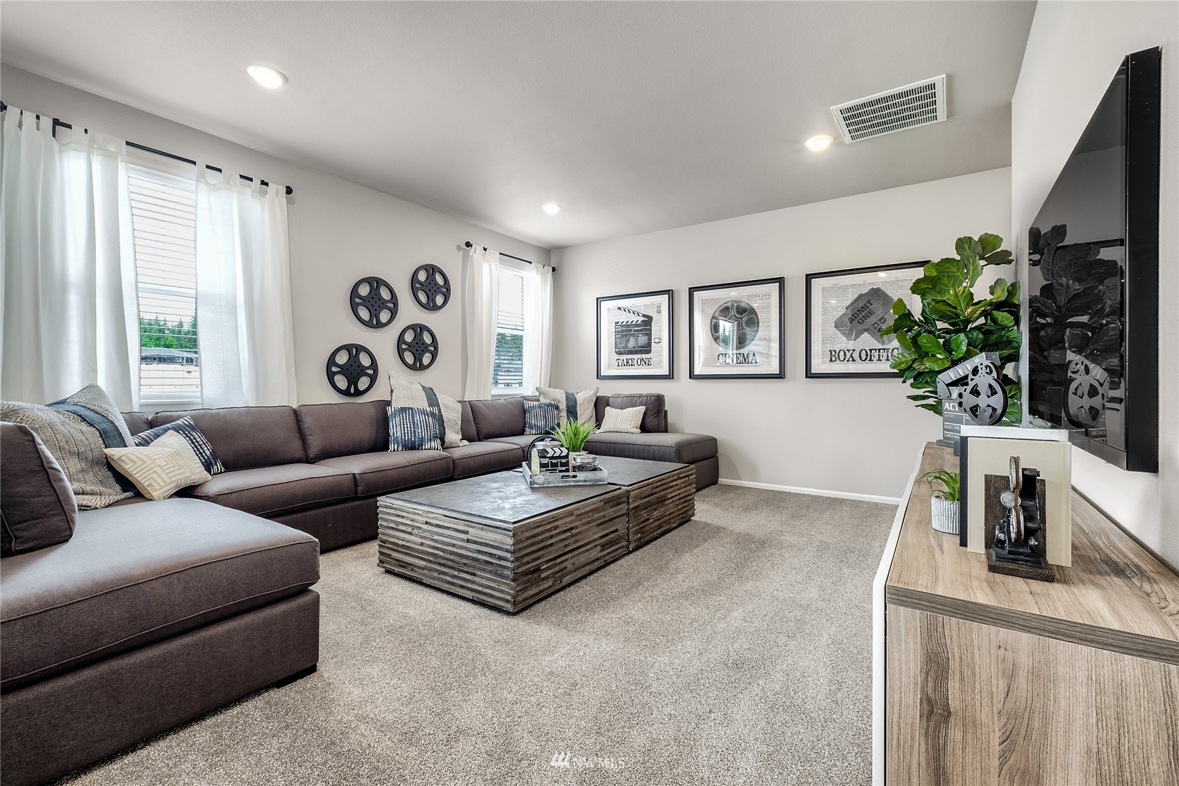23318 41st Drive Southeast, Unit 68 Bothell, WA 98021 - Photo 14 of 24 a living room with furniture and a large window