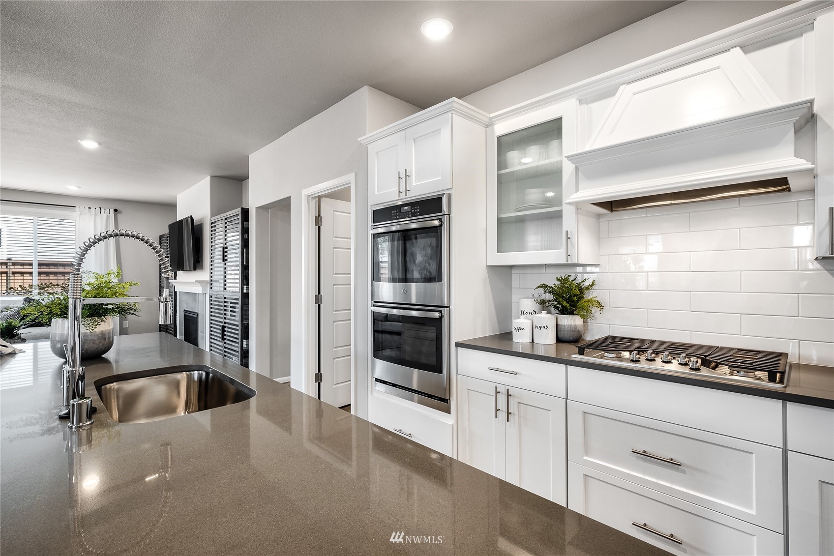 23318 41st Drive Southeast, Unit 68 Bothell, WA 98021 - Photo 10 of 24 a kitchen with granite countertop a cabinets and appliances