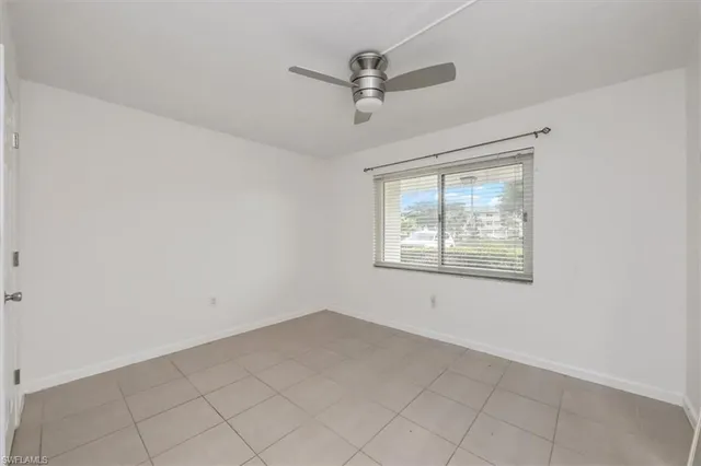 a view of a hallway with washer and dryer