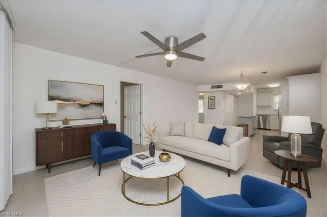 a view of a dining room kitchen furniture and a potted plant