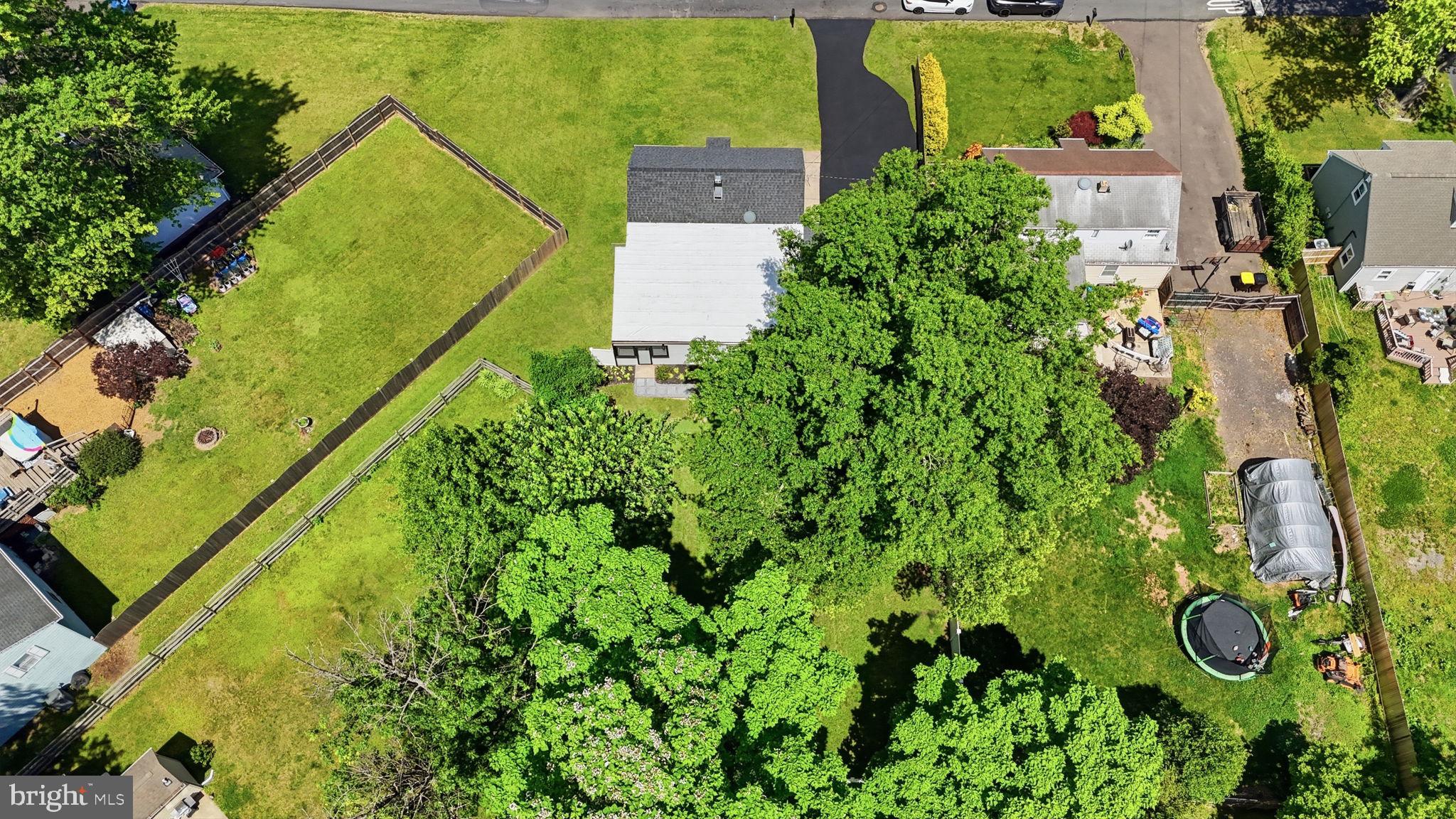340 West Broad Street Hatfield, PA 19440 - Photo 40 of 55 an aerial view of a residential houses with yard