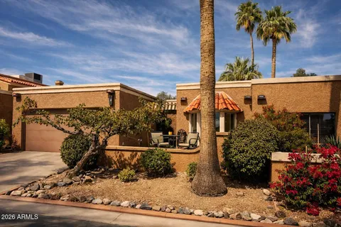 a house view with a outdoor space