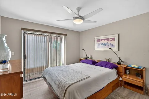 a view of a workspace with furniture and closet