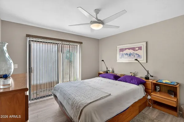 a view of a workspace with furniture and closet