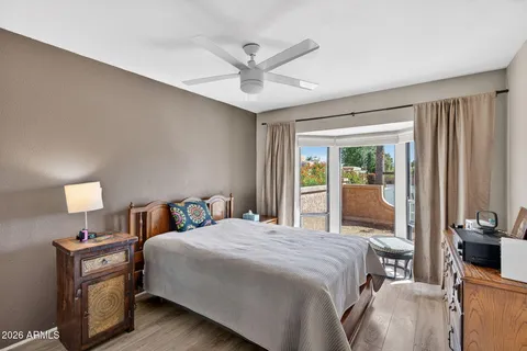 a bathroom with double vanity sink and mirror