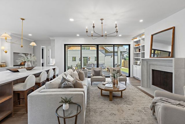 a bathroom with a toilet and a shower curtain