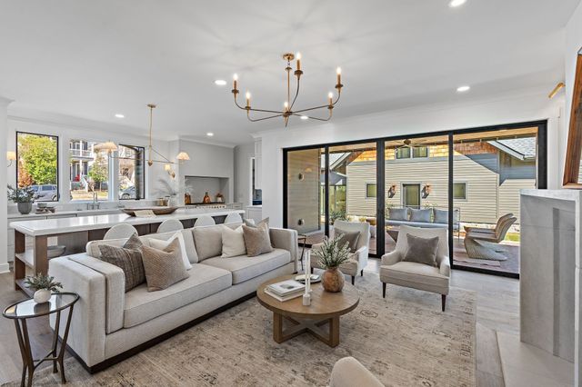 a kitchen with stainless steel appliances granite countertop a stove and a sink