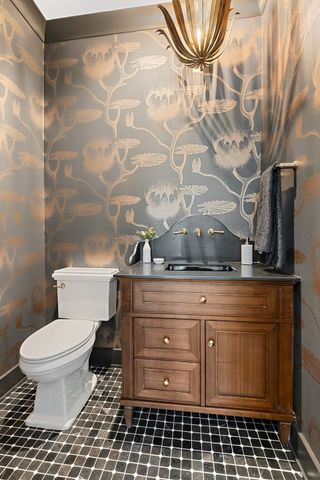 a kitchen with stainless steel appliances granite countertop a stove and a sink
