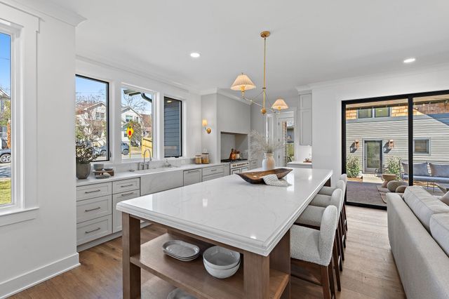 a bathroom with a sink a mirror and a shower