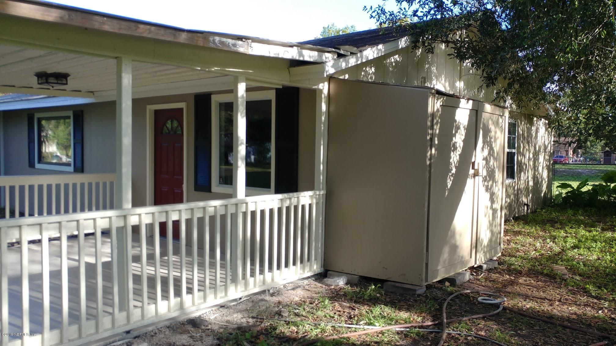 54102 Snyder Road Callahan, FL 32011 - Photo 3 of 14 a view of a house with a yard