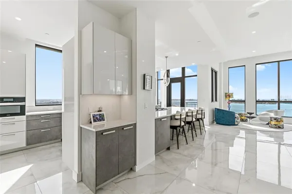 a balcony with furniture and city view